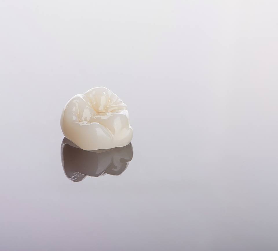 a close-up of a crown against a white background