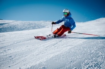 Person skiing on a snowy mountain
